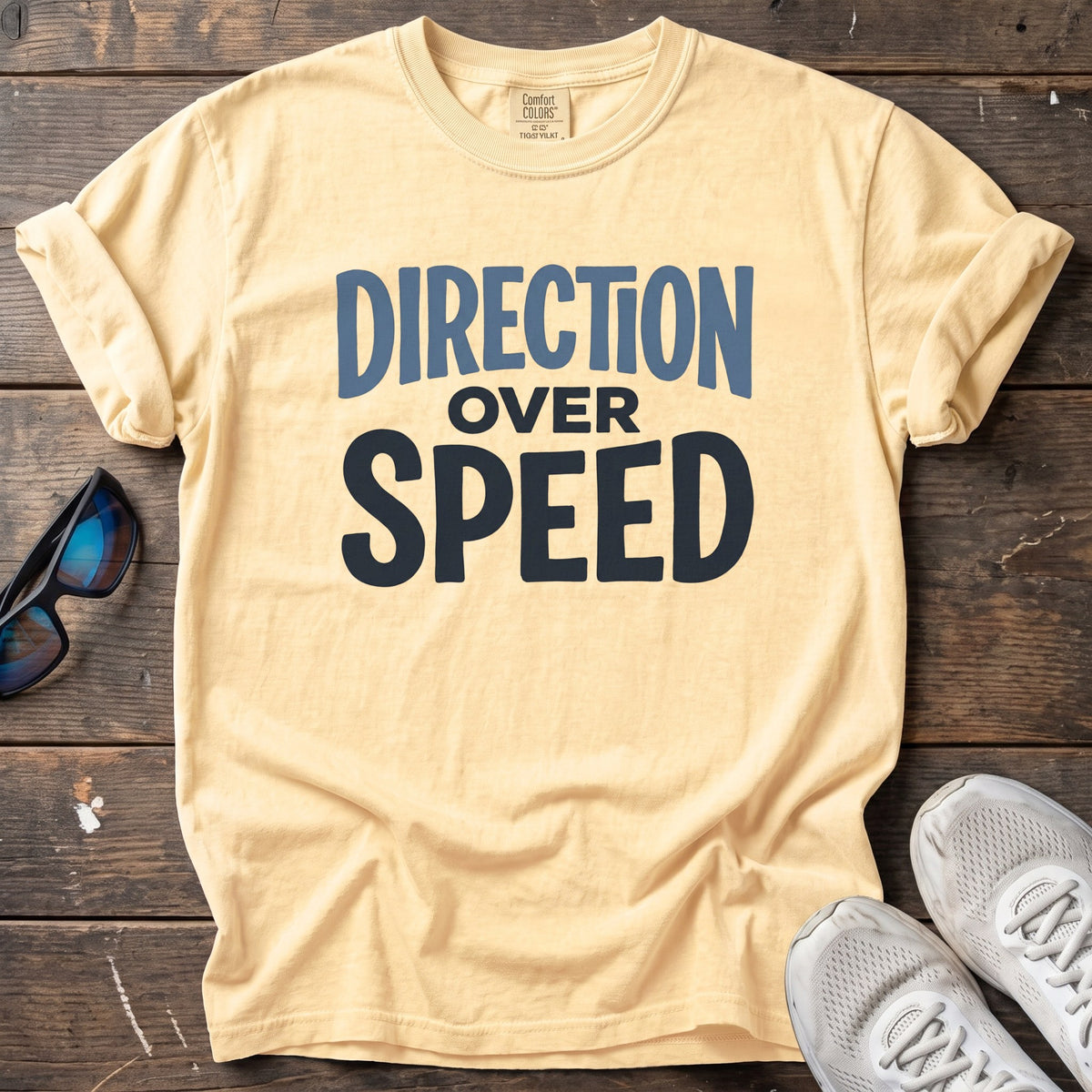 Direction Over Speed Text Tee — Butter