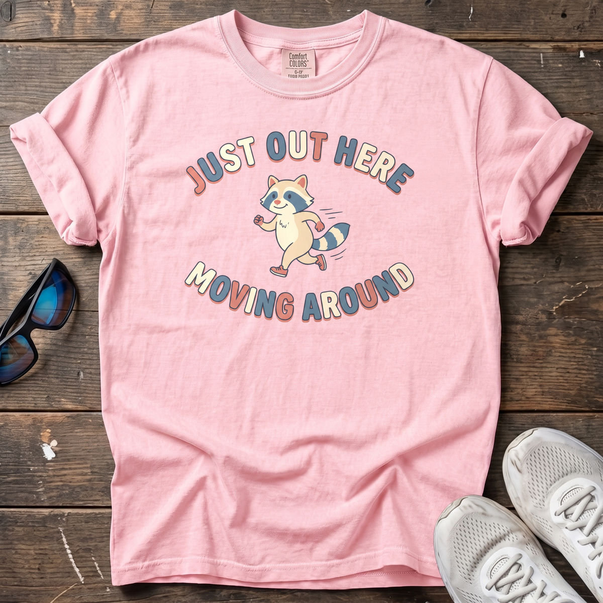 Just Out Here Moving Raccoon Tee — Blossom