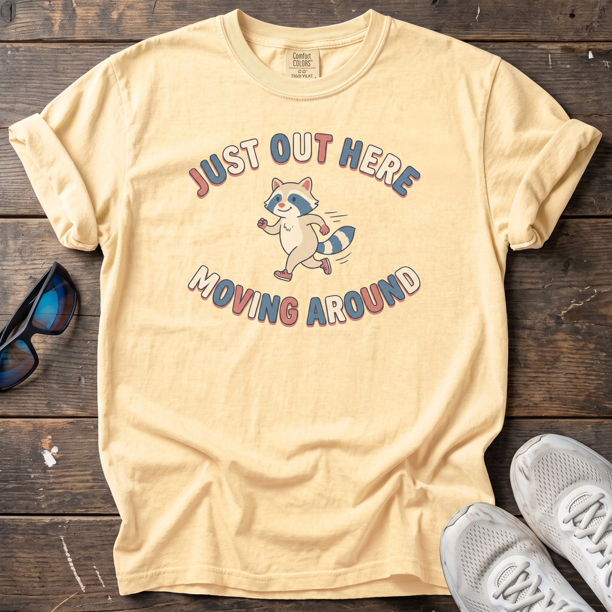 Just Out Here Moving Raccoon Tee — Butter