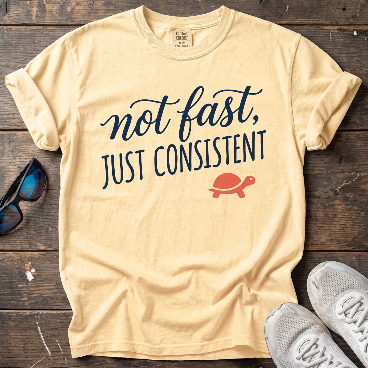 Not Fast, Just Consistent Tee — Butter